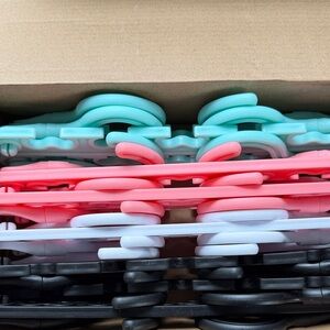 12 pack of Multicolor Plastic closet or organizers Mint, Coral, White, Black